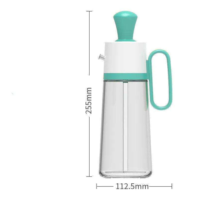 Yellow 2 in 1 oil dispenser with silicone brush next to glass bottle