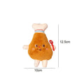 Five cat teething toys shaped like hamburger, chicken leg, fries, hot dog and bread on white background