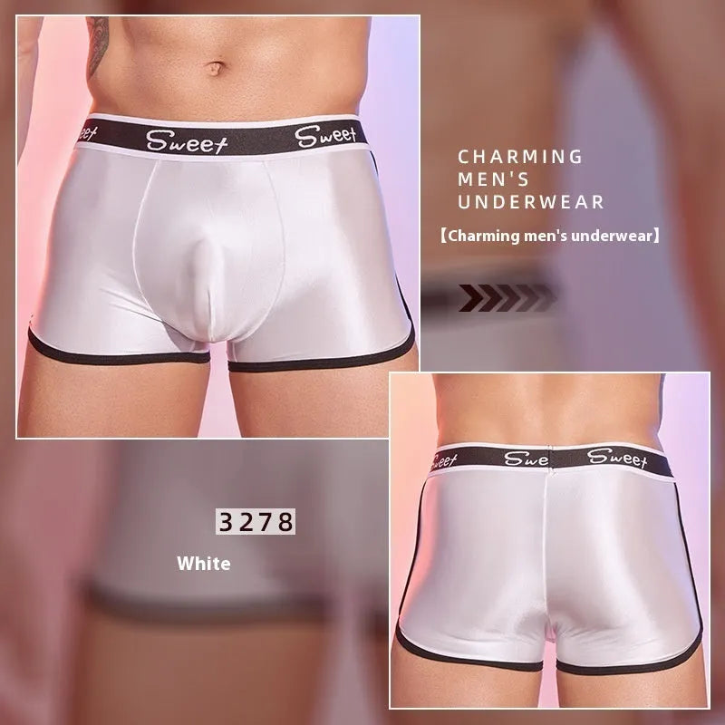Men's shiny silky nylon boxer shorts in black, white, and sapphire blue colours.