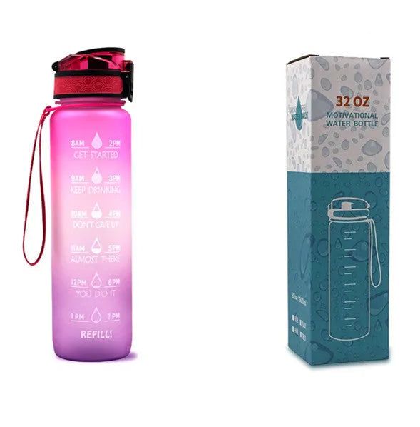 Blue and red gradient 1-litre Tritan sports water bottle with time markers, flip-top lid, and wrist strap.