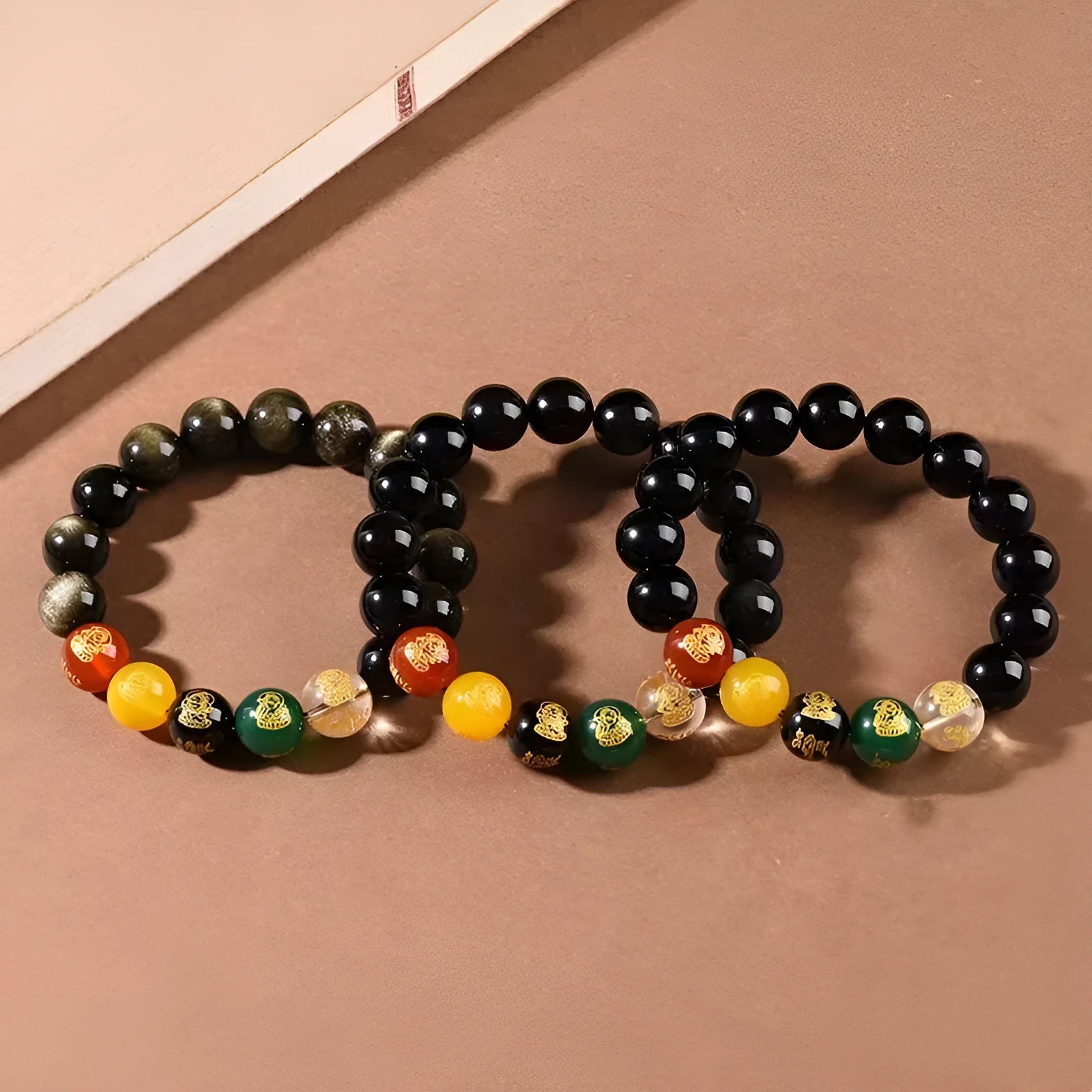 Men's rainbow eye obsidian and gold obsidian crystal bracelet with xiangyun motifs in New Chinese style
