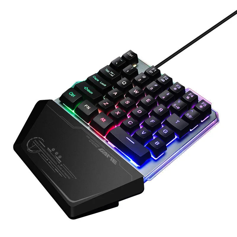 Black Robotic G40 one-handed mechanical keyboard with RGB backlit keys on a desk