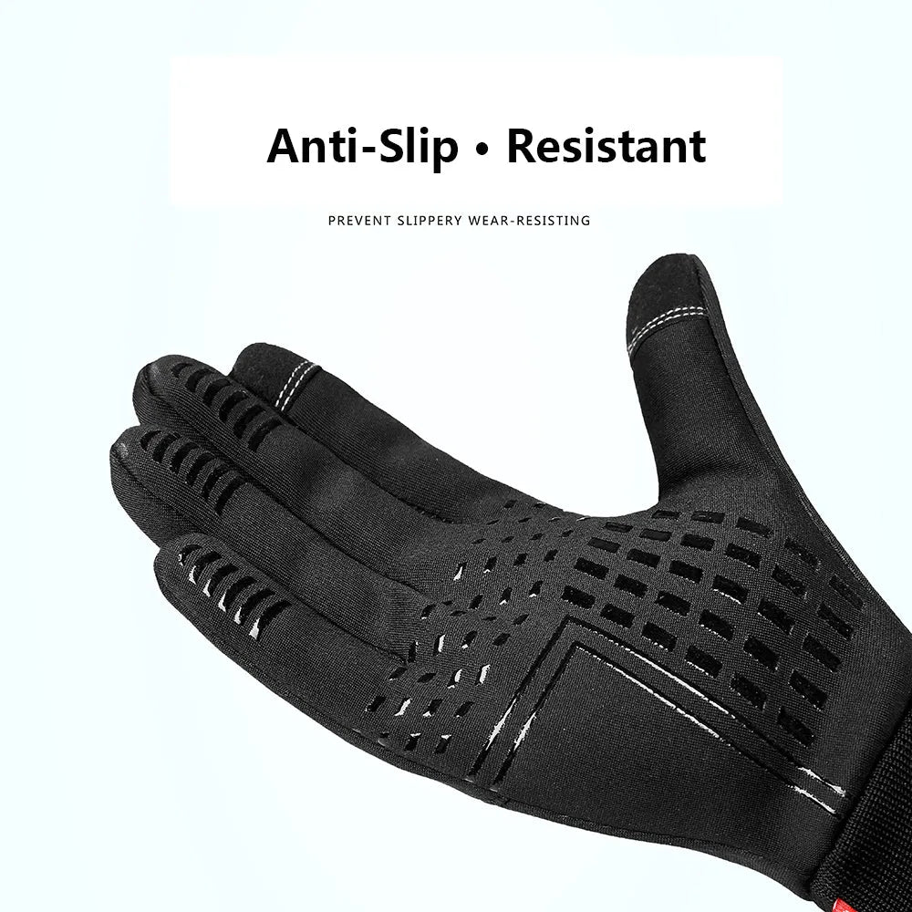 Pair of black winter outdoor sports gloves with touchscreen fingertips on a neutral background
