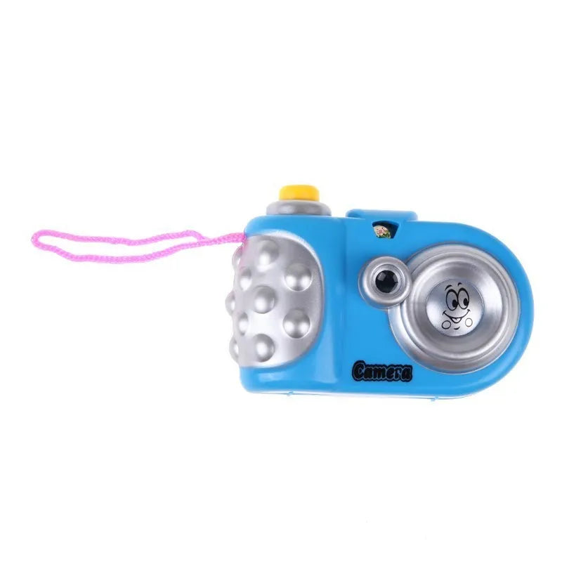 Blue and pink kids projection camera toy showing animal images with sliding lens