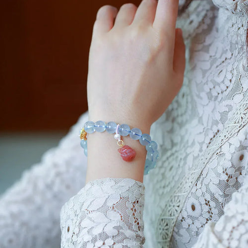 Aquamarine beaded bracelet with Chinese fengjiu fox charm in pearl or pink crystal colour variations