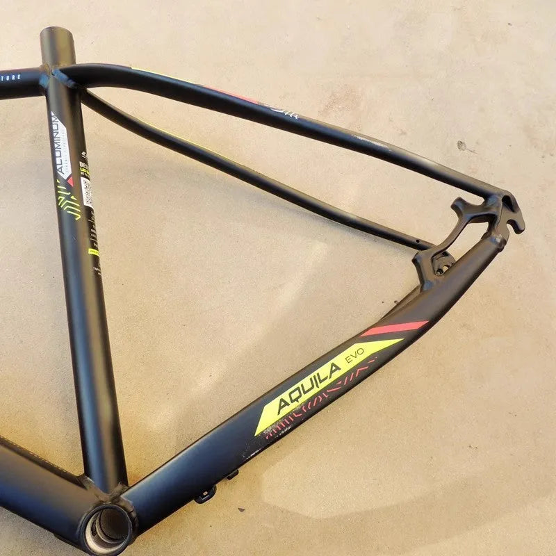 Black green aluminium mountain bike frame for 29-inch wheels with internal cable routing ports