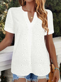 White women's oversized V-neck T-shirt with hollow-out lace detail on chest, short sleeves, loose fit.