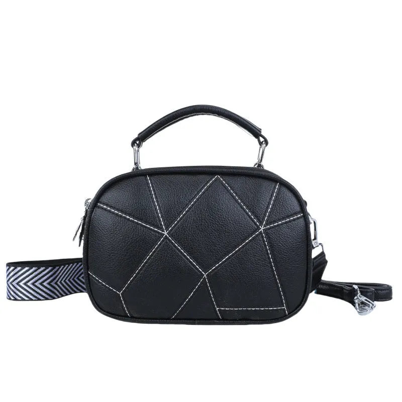 Round grey retro patchwork PU leather crossbody bag with stitching details