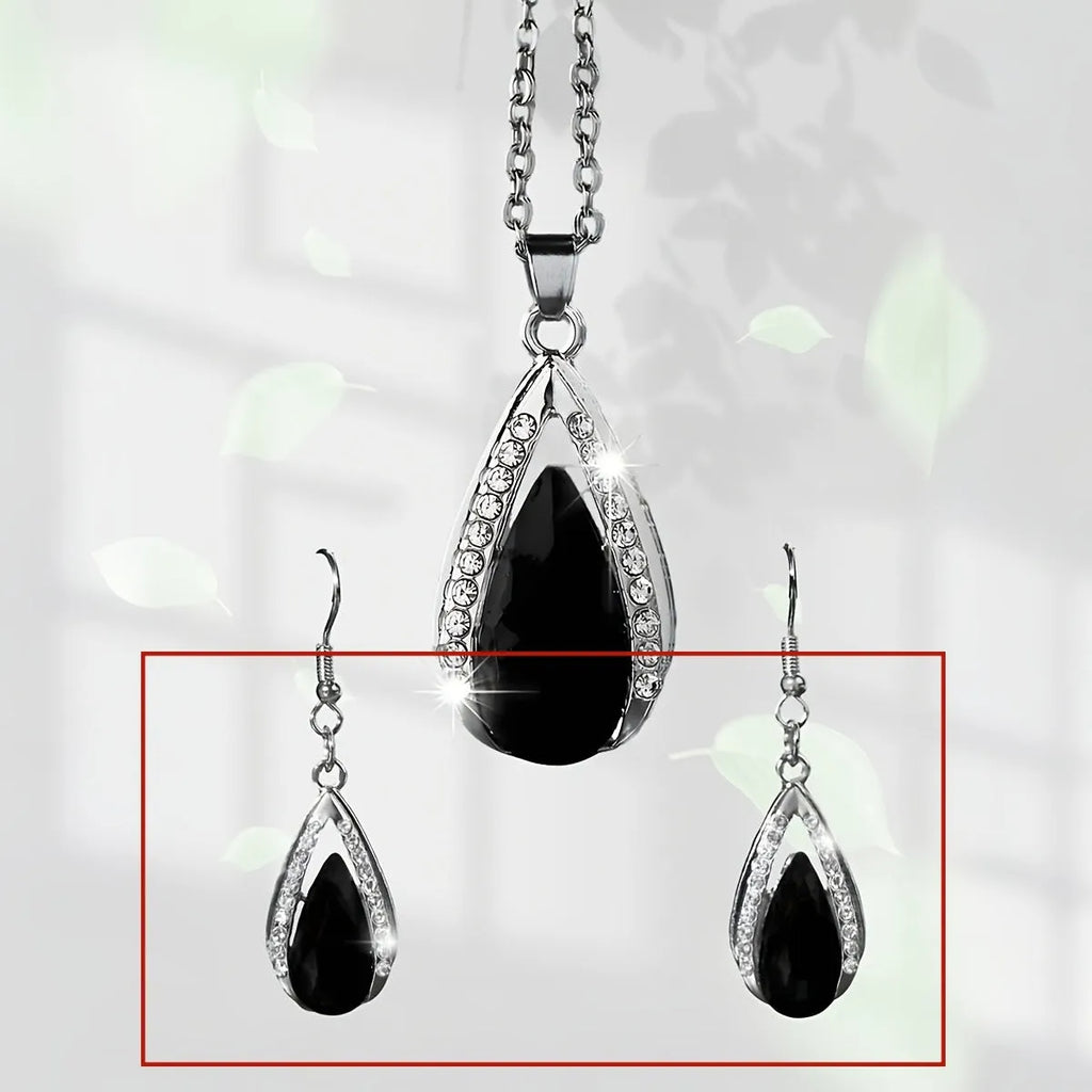 Black and red teardrop-shaped glass pendant necklace and matching earrings set on alloy chain.