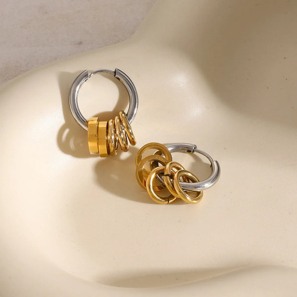 A pair of ins style stainless steel earrings with an electroplated silver-coloured finish.