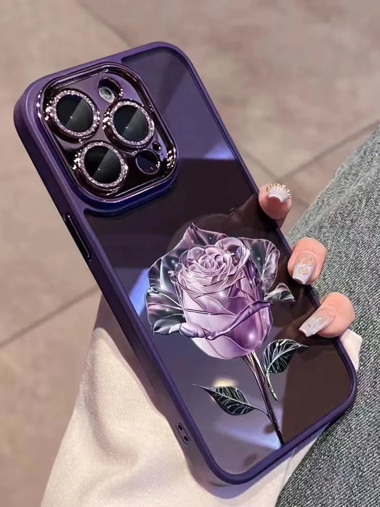 Dark purple TPU iPhone case with pink rose design and sparkling pink lens film over cameras.