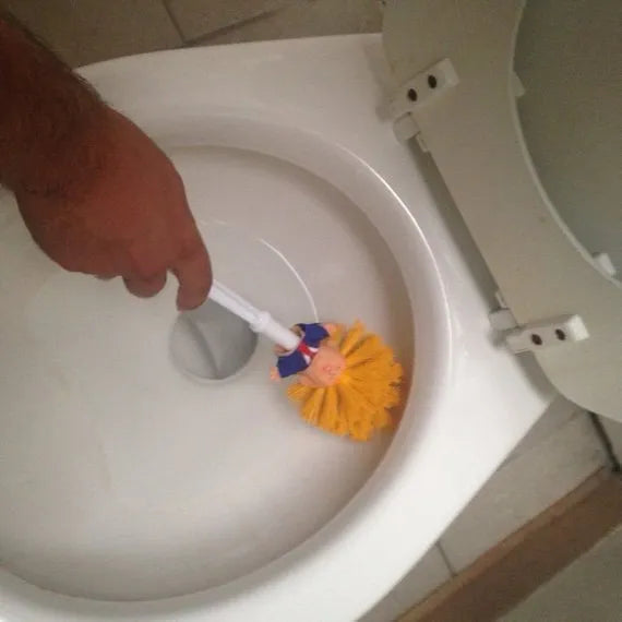 Yellow plastic Donald Trump novelty toilet brush with hanging slot, 40cm length