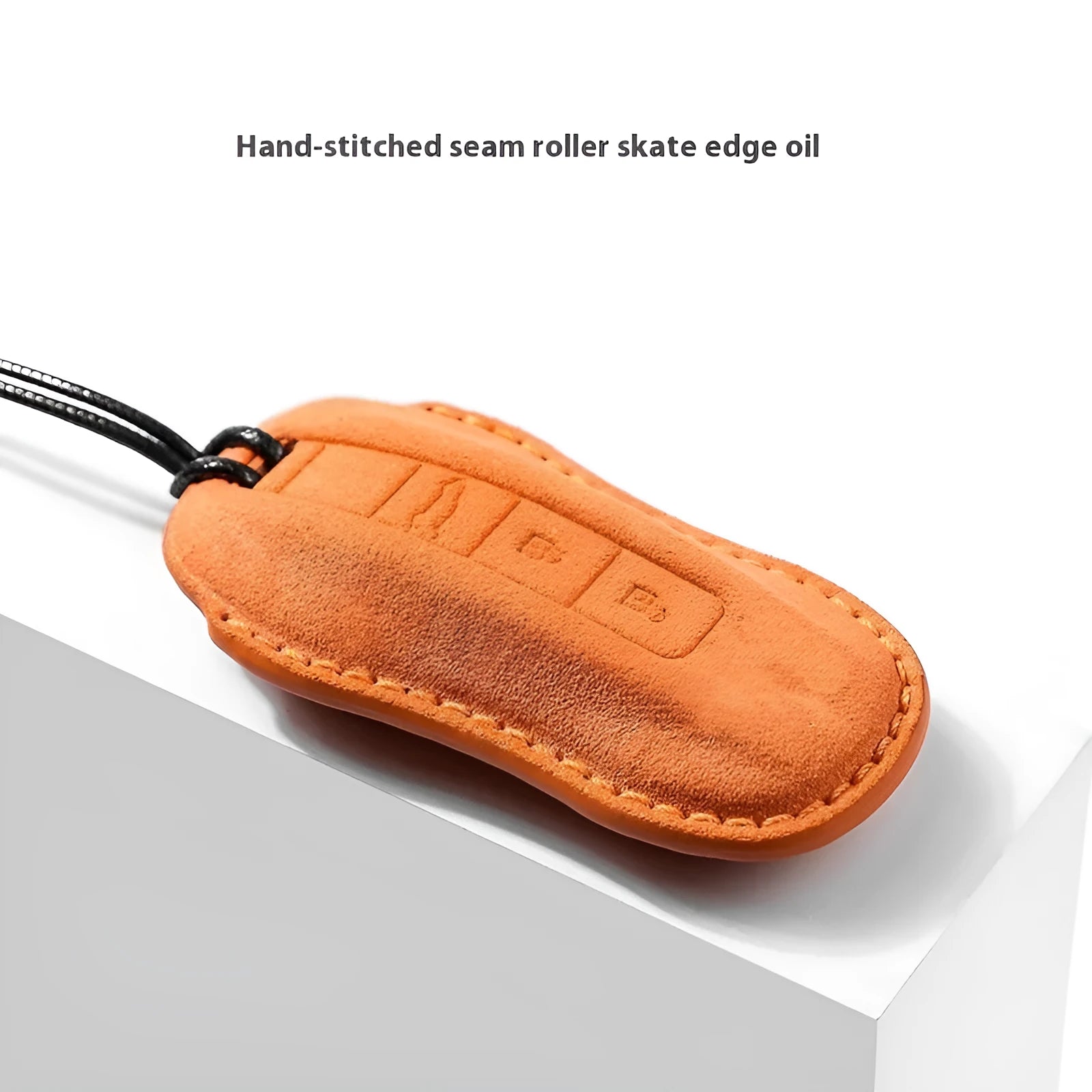 Suede car key cover in Cement Gray, Dark Green, Light Gray, and Orange colour options.