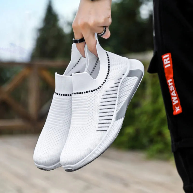 Men's black and white striped mesh slip-on sneakers with flyknit upper and lace-up front