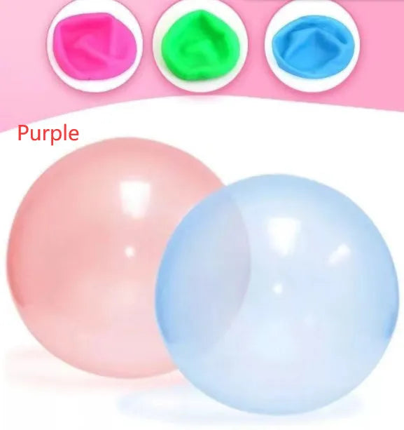 Assortment of inflated pink, yellow, blue and green TPR bouncy balls in different sizes on a plain background.