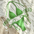 Women's halter lace-up bikini swimsuit in milky white, green, or white, briefs style.