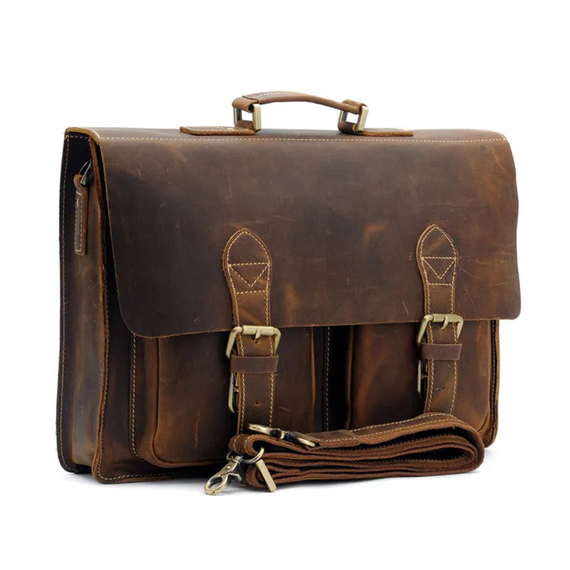 Men's yellow brown cowhide leather messenger bag with shoulder strap and nylon lining.
