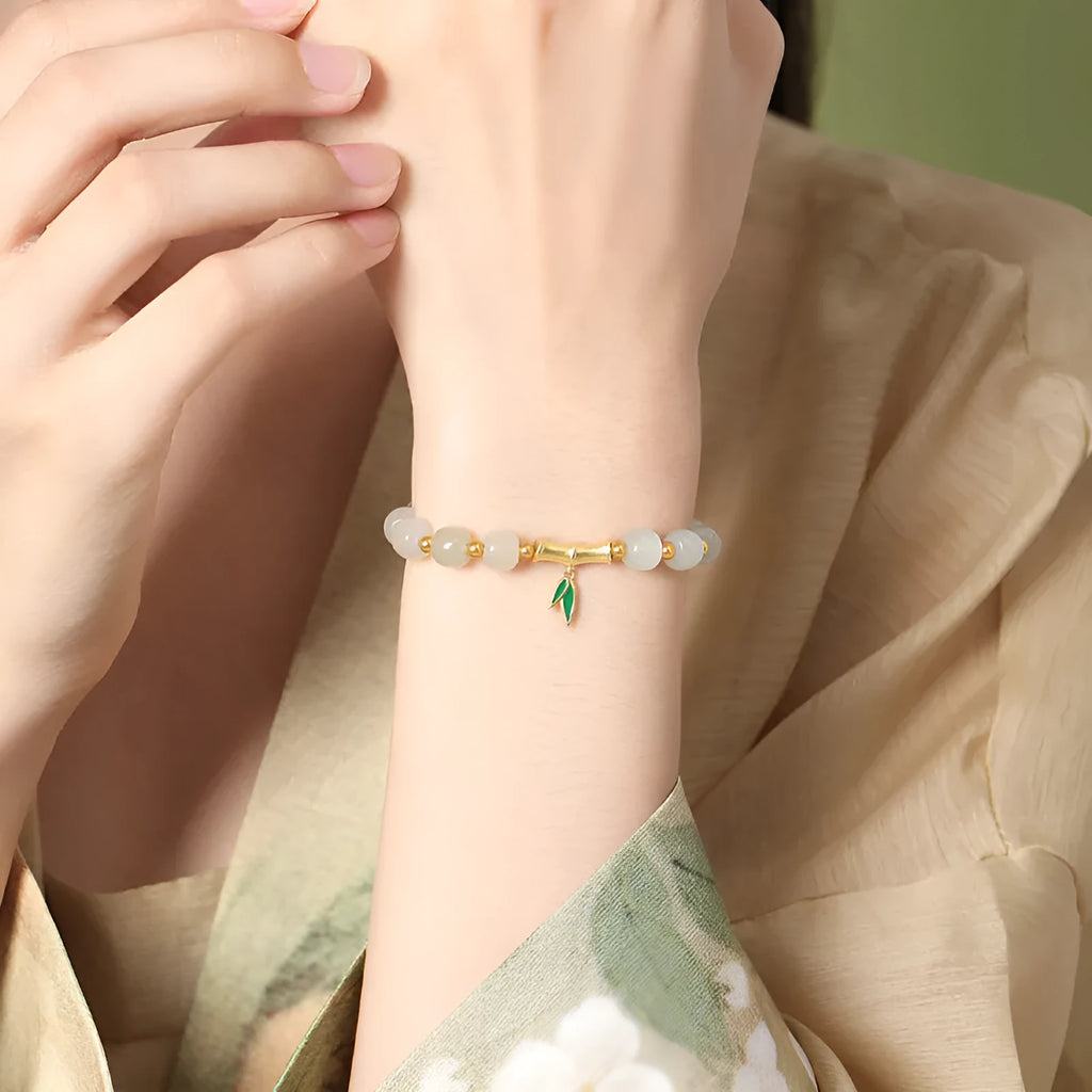 S925 sterling silver bracelet with Hetian jade beads and bamboo leaf charms in gold colour