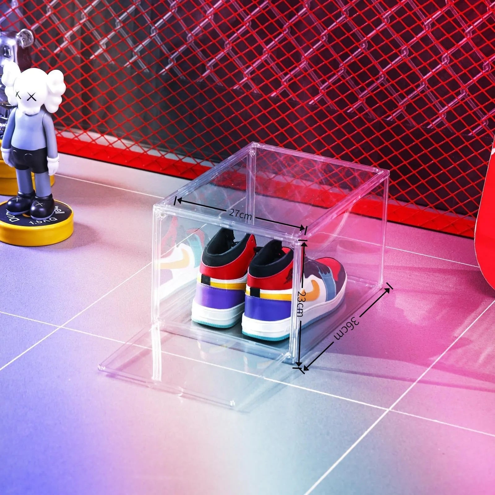 Large transparent acrylic shoe storage box with a magnetic side door open, showing interior space.