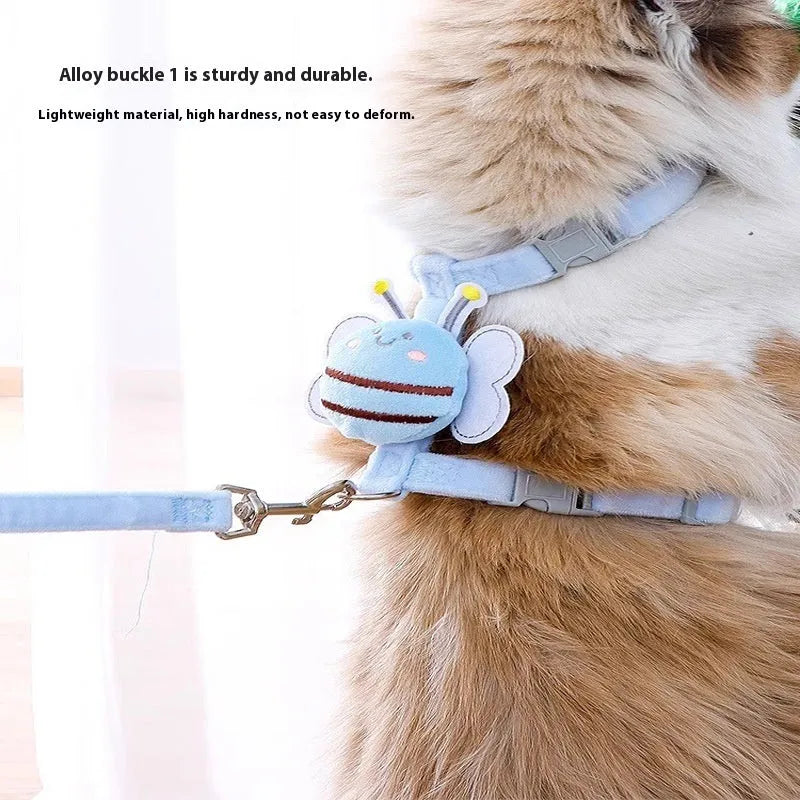 Pink adjustable bee-shaped cat leash with a teddy texture handle for outdoor walks.