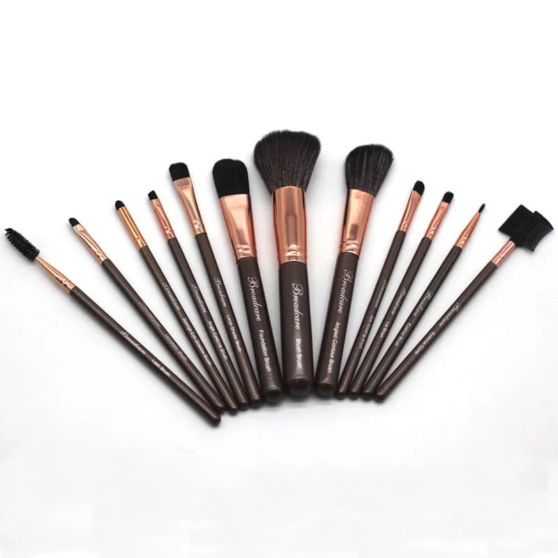 Multi-function makeup brush set with synthetic fibre bristles, long plastic handles, and brown PU storage bag on a flat surface