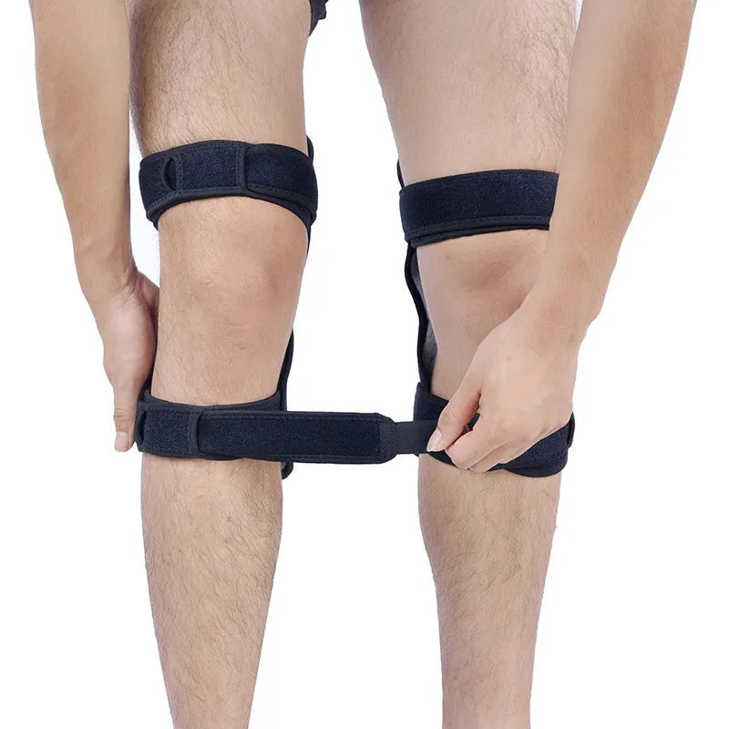 Adjustable knee brace with booster spring mechanism in breathable fabric for sports support