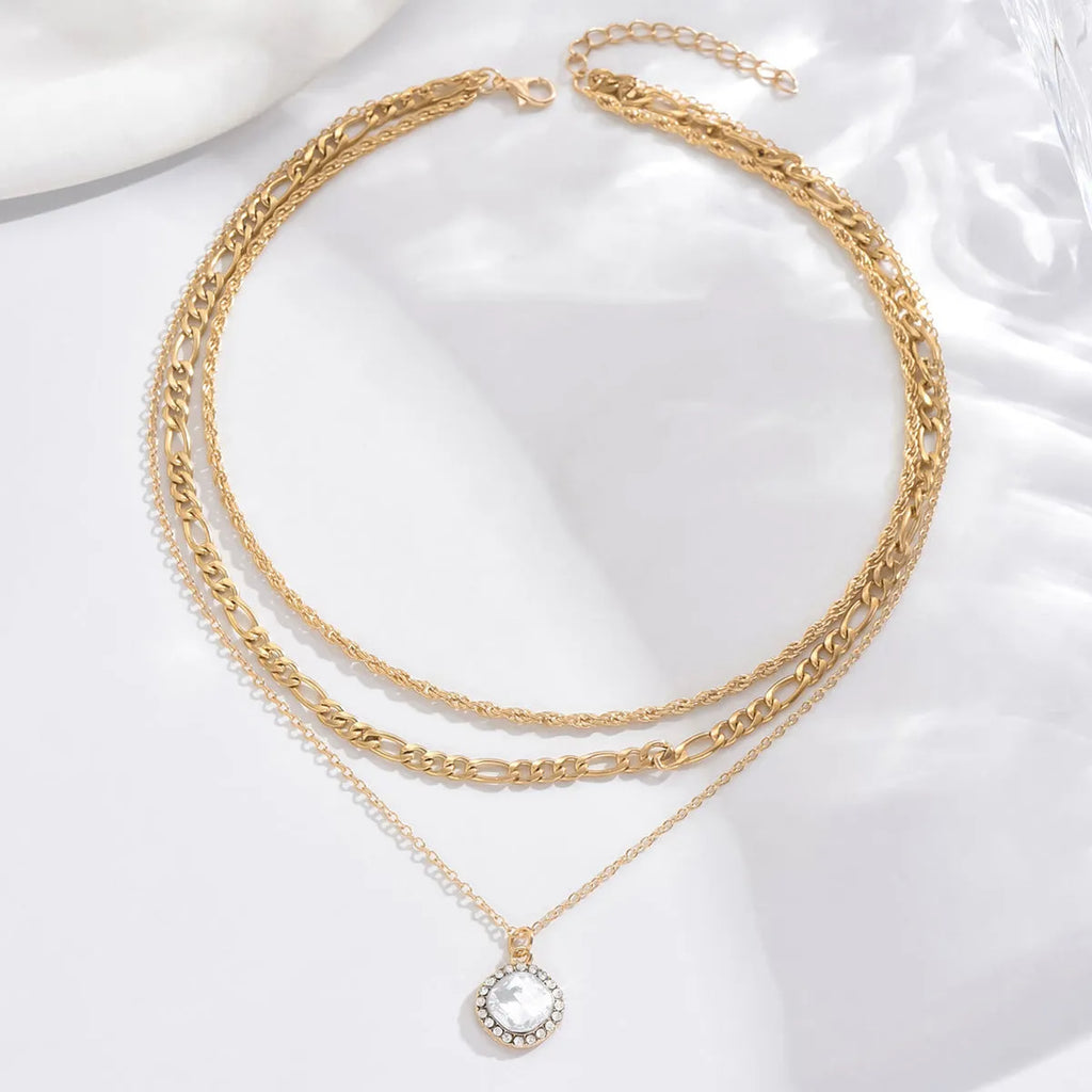 Gold multi-layer pendant necklace with large hemp flowers chain and round geometric pendants on alloy base