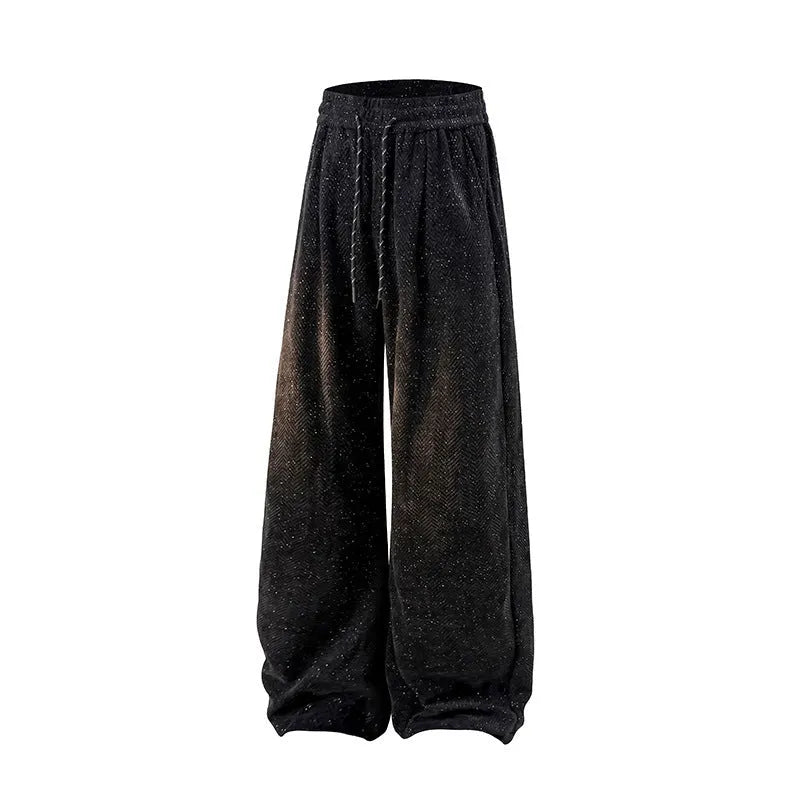 Man's grey straight-leg hollow-out casual trousers with elastic waist, shown in a plus size fit