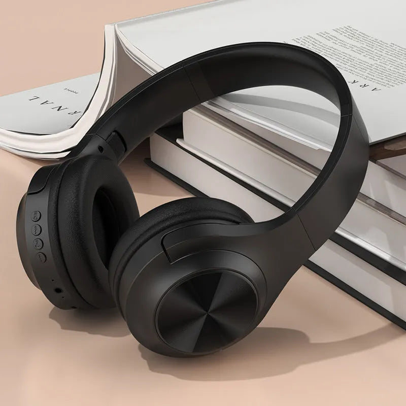 Wireless Bluetooth headset with head-mounted design in Youth Green colour, shown with its charging case.