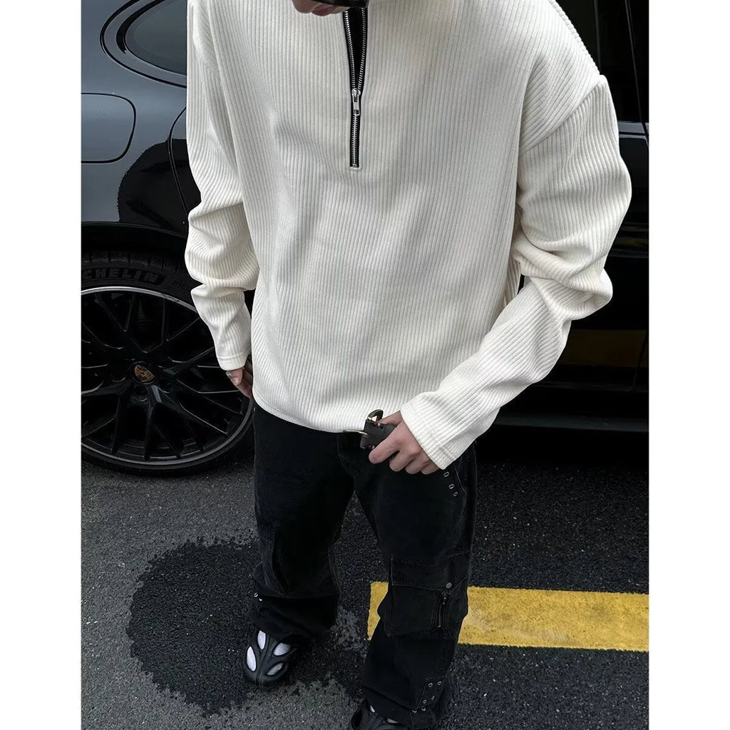 Men's solid grey loose-fit long sleeve pullover top on a hanger.