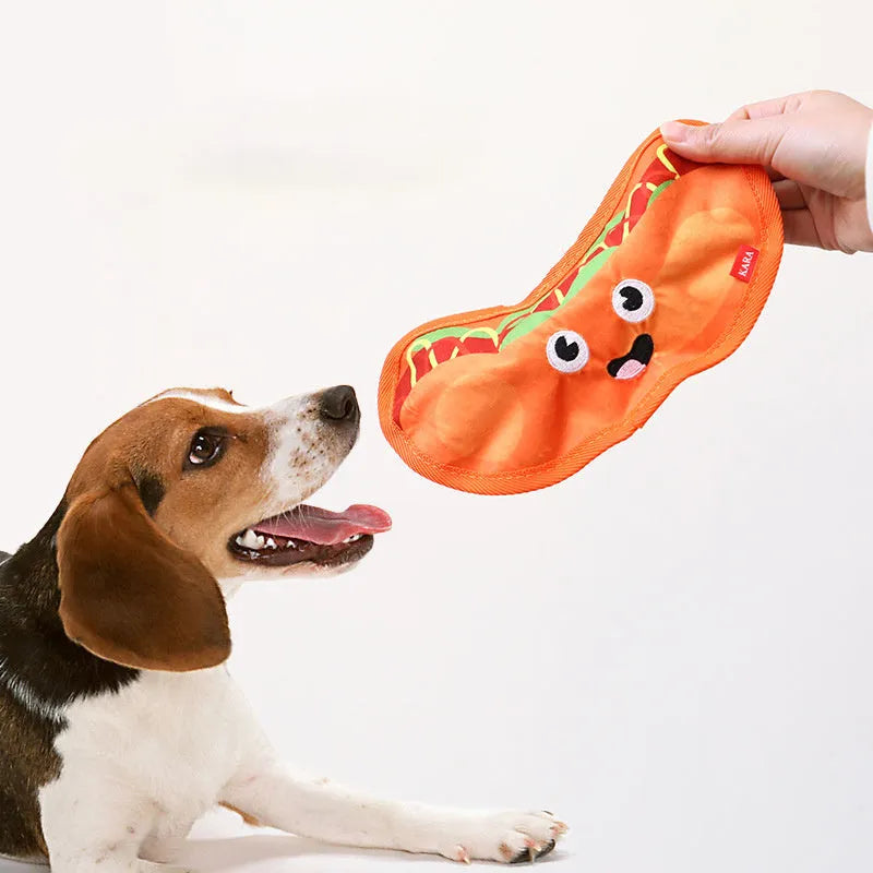 Food-shaped dog chew toys with crinkle and squeaker features including burger, fries, hot dog and pizza designs