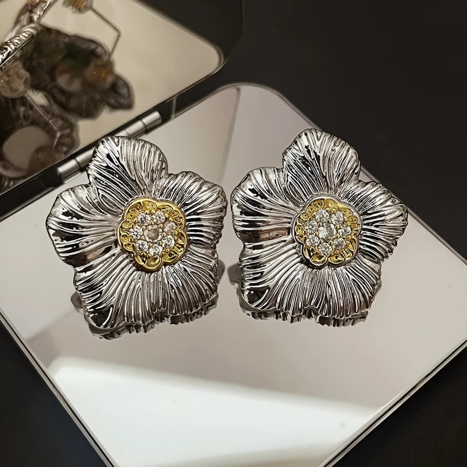 Pair of copper gardenia stud earrings with textured petals in a two-tone electroplated finish