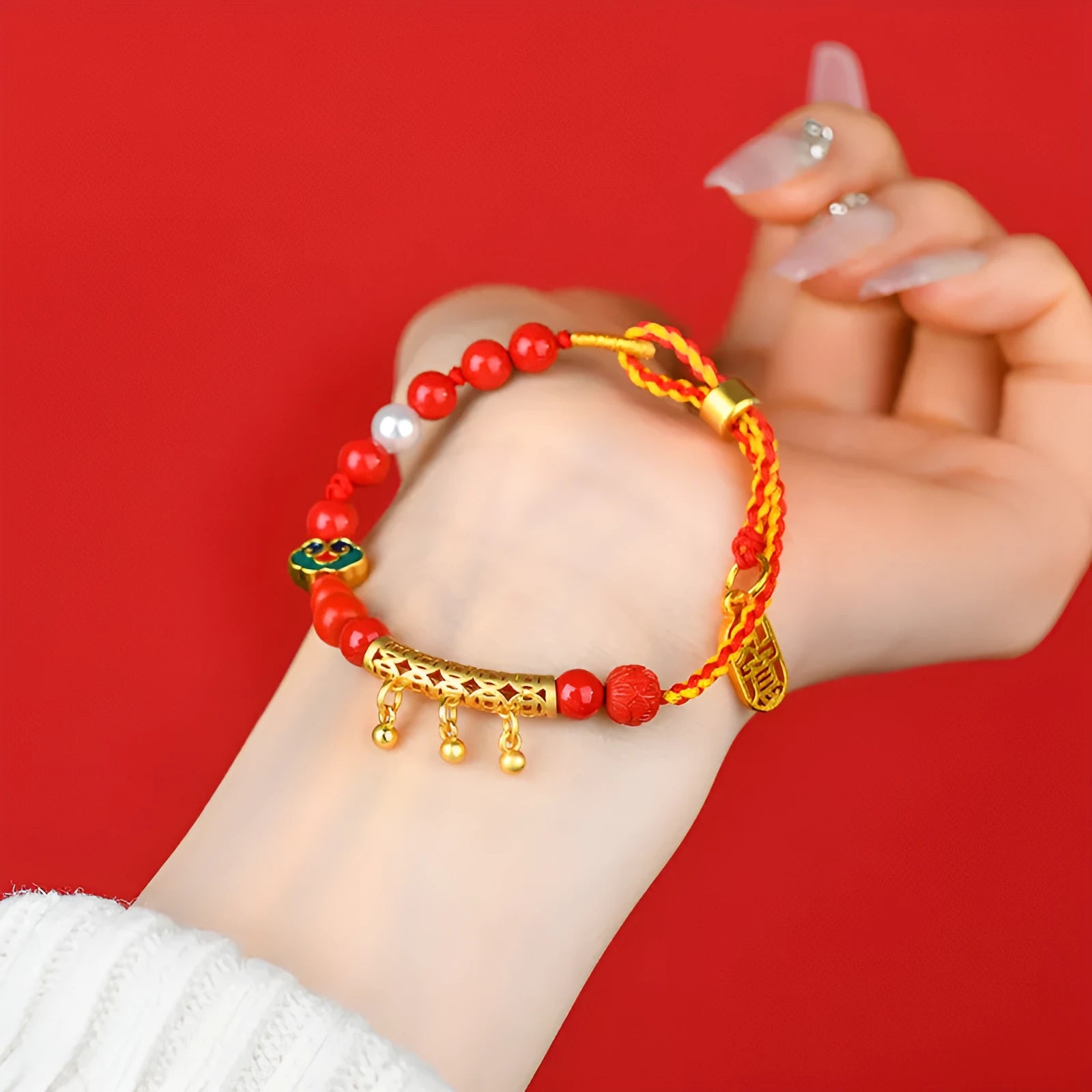 Women's red cinnabar hand-woven rope bell bracelet with geometry shapes and national style design