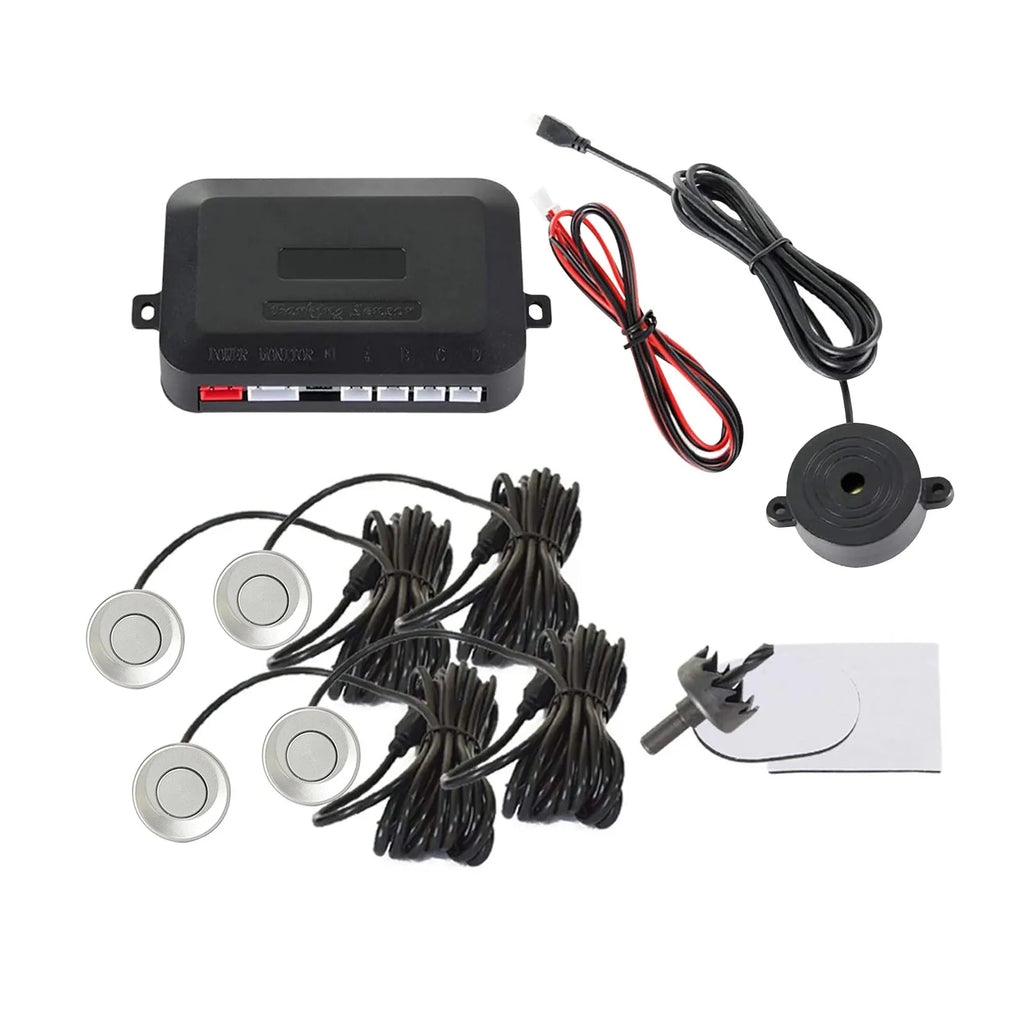 4-probe buzzer-only car reversing radar kit with sensors, control module, and hole saw on a grey background.