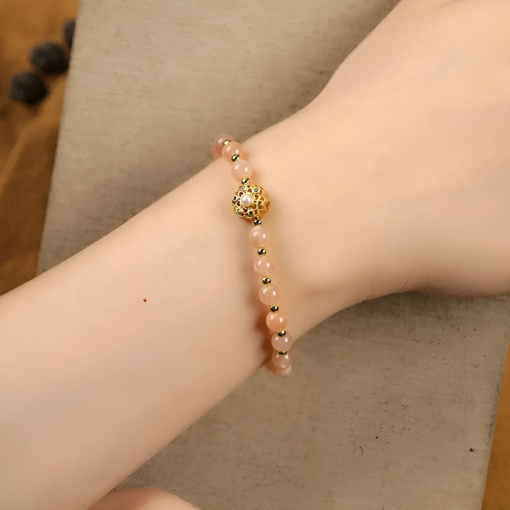 Hand-woven crystal bracelet with grey moonstone, sunstone, and strawberry quartz 6mm beads
