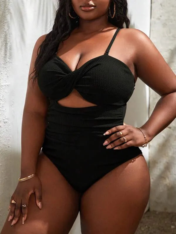 Plus size women's black sling triangle one-piece swimsuit with polyester and spandex stretch fabric