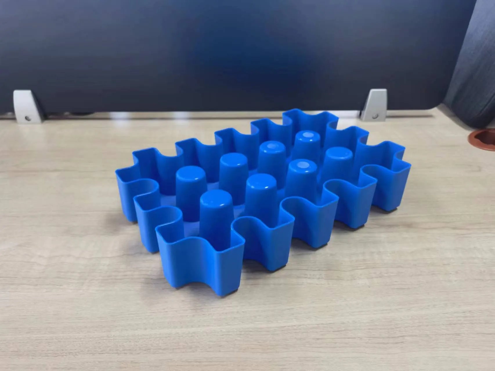 Blue polypropylene ice maker tray measuring 34cm long for outdoor camping and barbecues