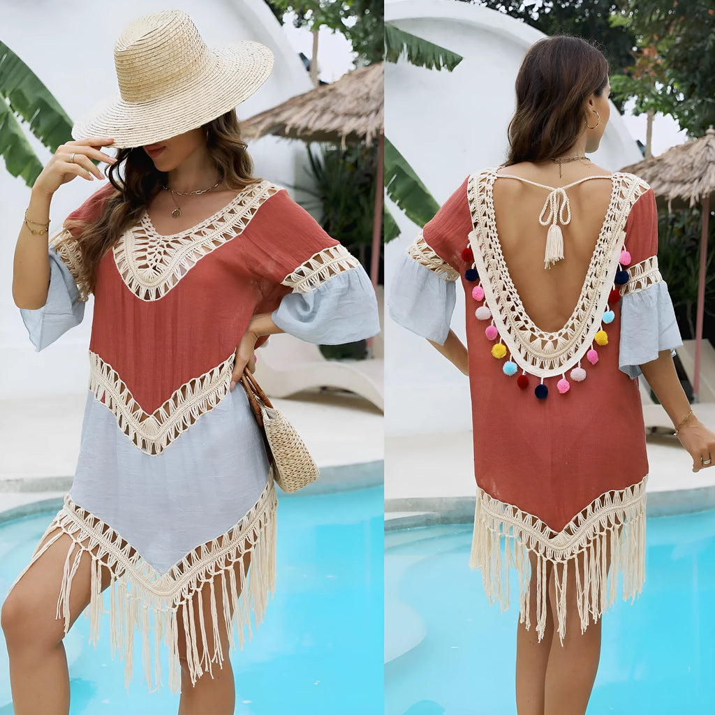 Orange hand crochet beach overskirt with floral pattern and tassel decoration
