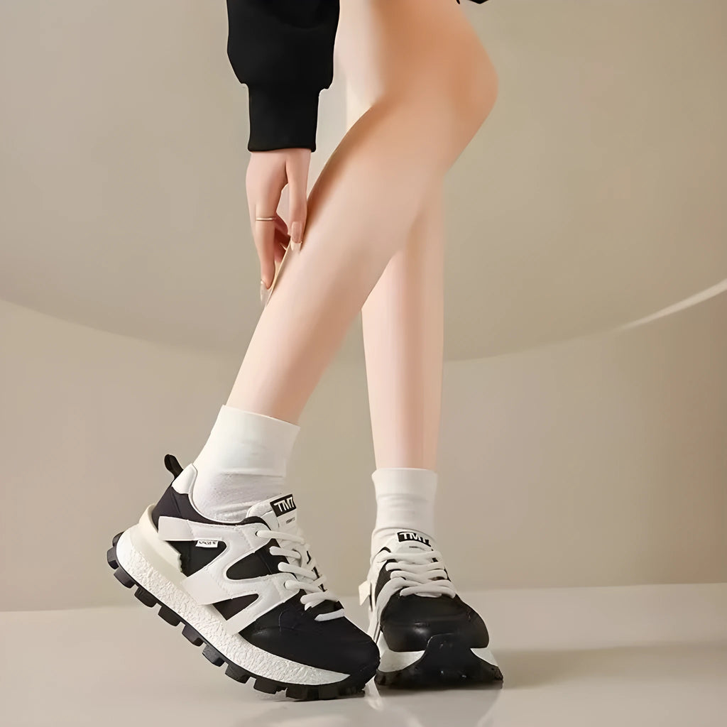 Women's casual platform sneaker in Milky White with front lace-up, flat heel, and round toe