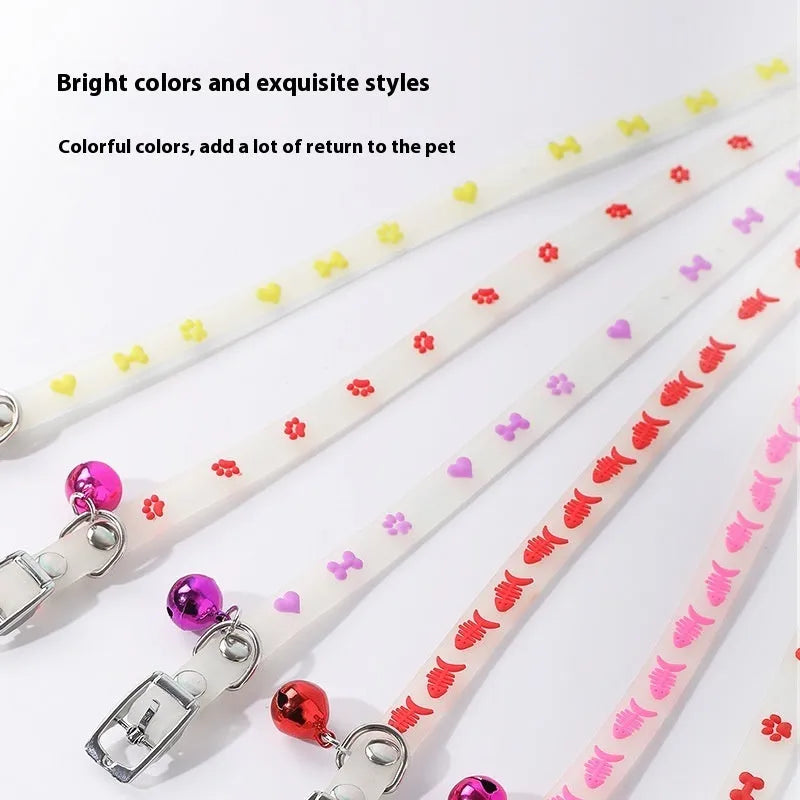 Luminous cat collar with adjustable silicone strap and metal bell in one of four patterns