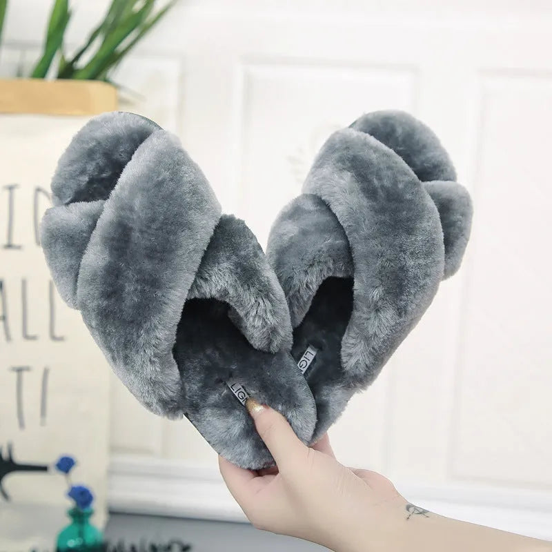 Women's cross open-toe fur slippers in assorted colours on a patterned non-slip sole.