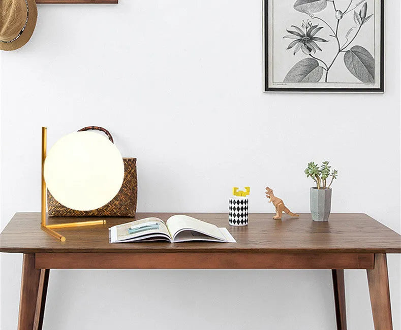 Creative LED lamp with glass shade in three size options showing three-tone lighting capability