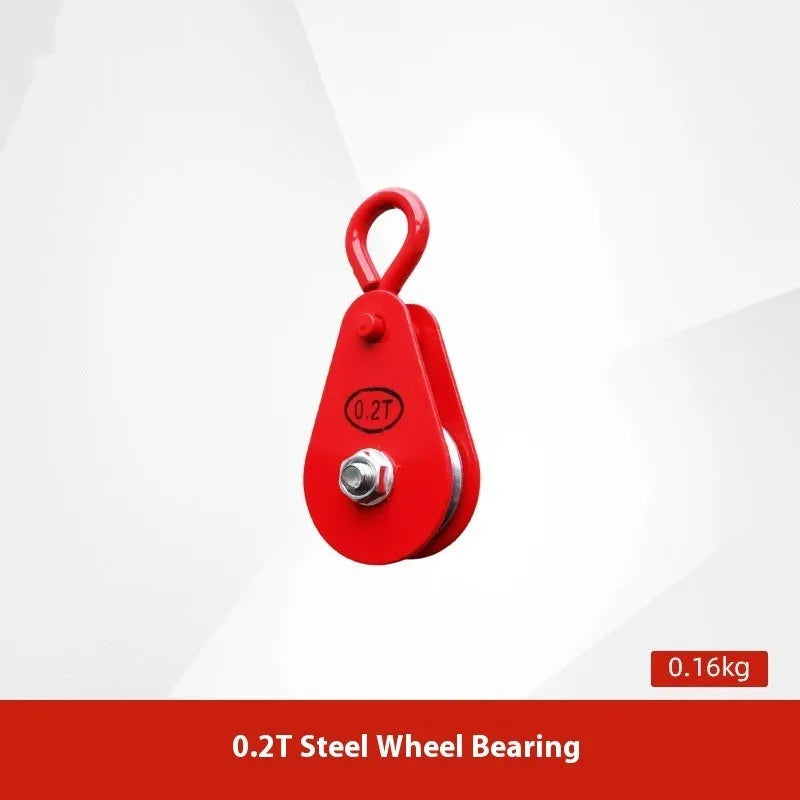 Red industrial steel lifting pulley with a safety latch on the hook for secure lifting.