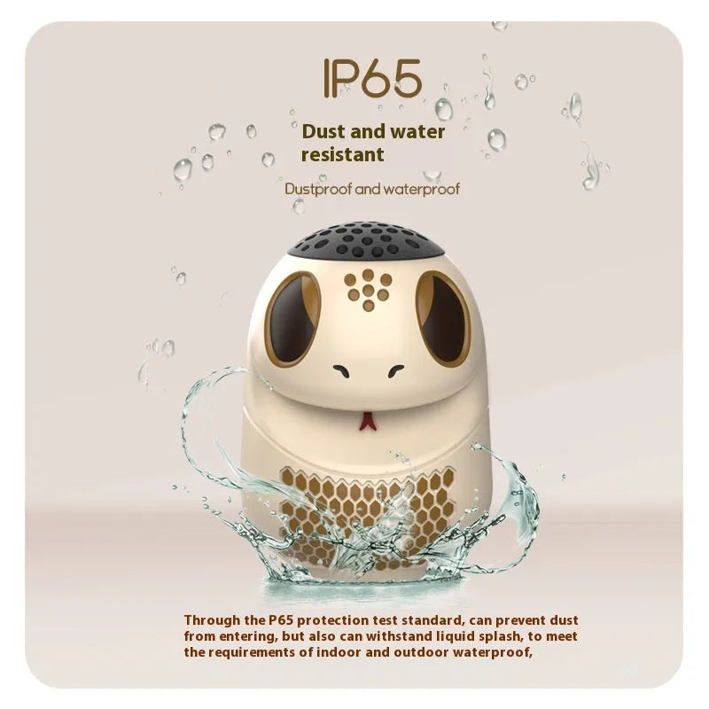 TK900 White cartoon-design Bluetooth speaker with waterproof construction and lighting effects