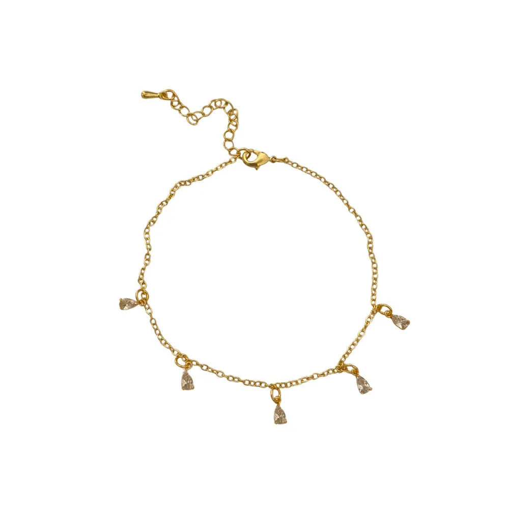 Women's zircon necklace, earrings, and anklet set with geometric pendant and meteor shower design.