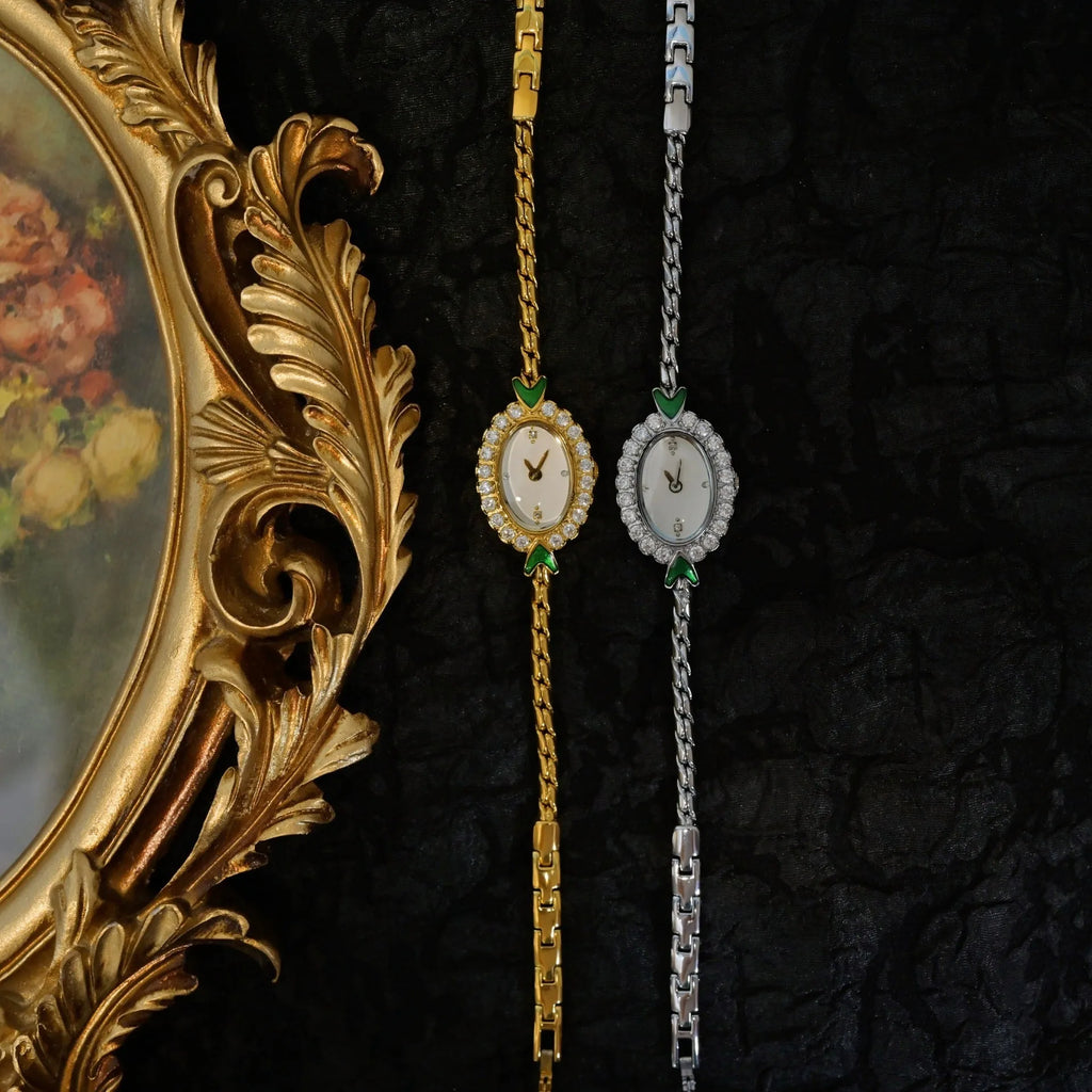 European small gold women's watch with handmade rhinestone inlay and adjustable strap on light background