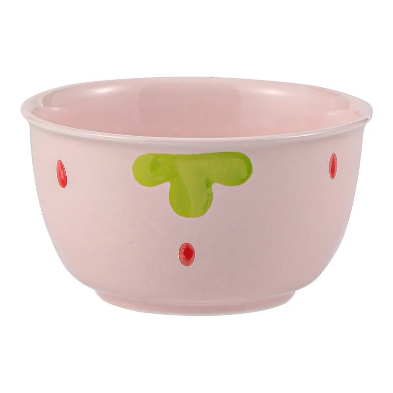 Creative strawberry-themed porcelain dinnerware set with fish plate, flower bowls, and straw hat plate.