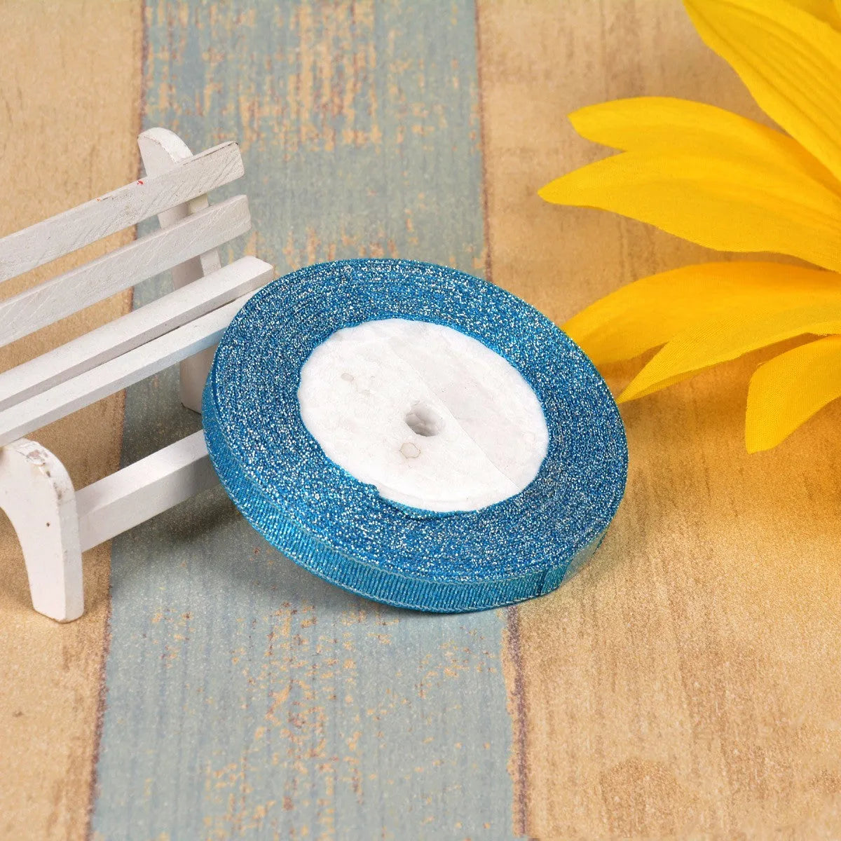 Colourful green onion pattern polyester ribbon spool with metallic gold or silver wire detailing.