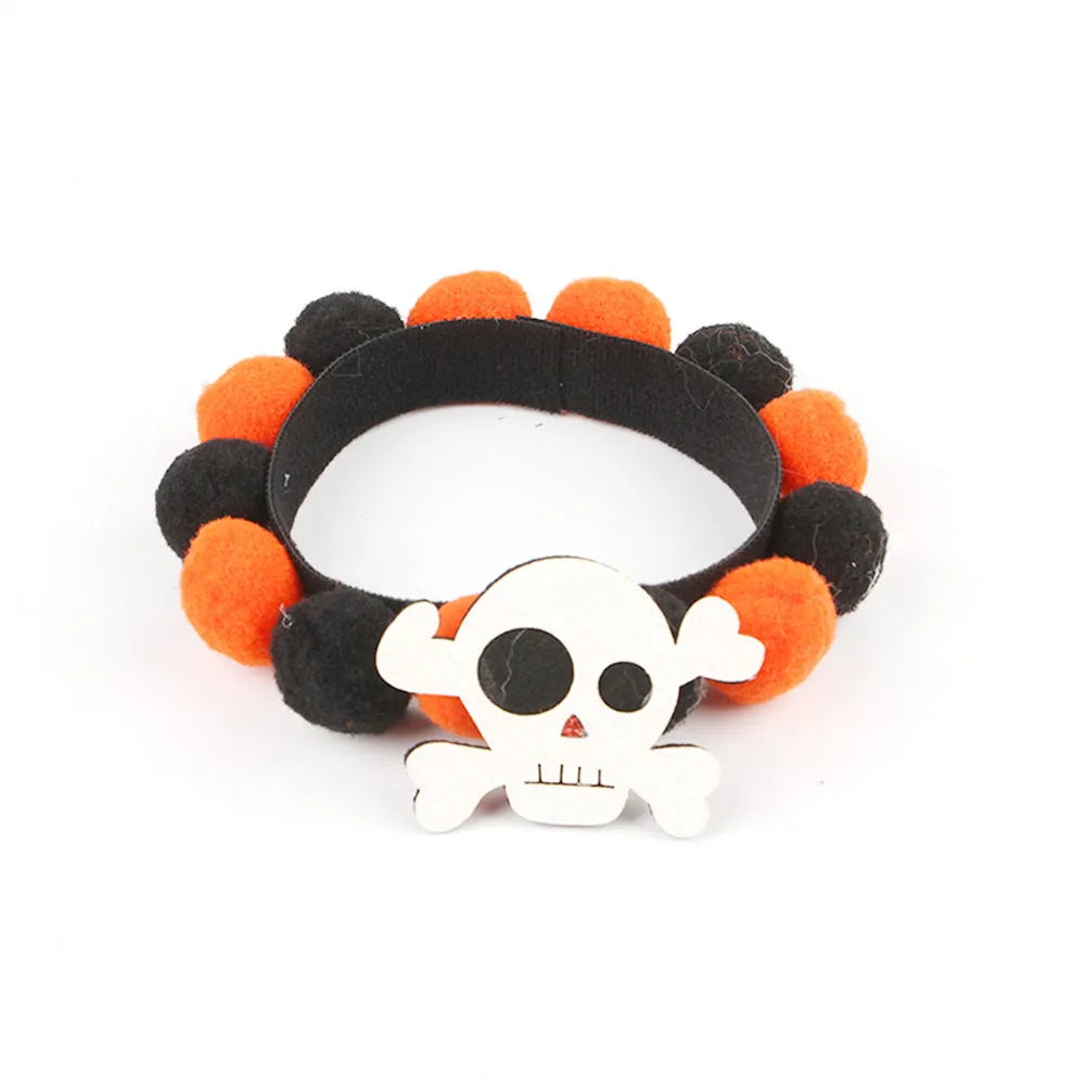 Halloween pet collar with a fur ball decoration in a pumpkin design, shown in size M.