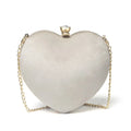 Heart-shaped plush cotton chain bag with card pocket in pink colour on plain background